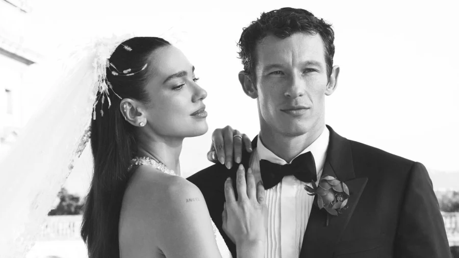 Dua Lipa with Callum Turner in a black-and-white portrait from their Sicilian wedding