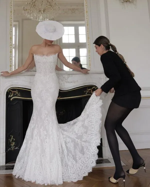 Lee Petra Grebenau fitting a couture wedding gown