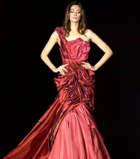 Model wearing the crimson Nightingale of Kuala Lumpur diamond gown