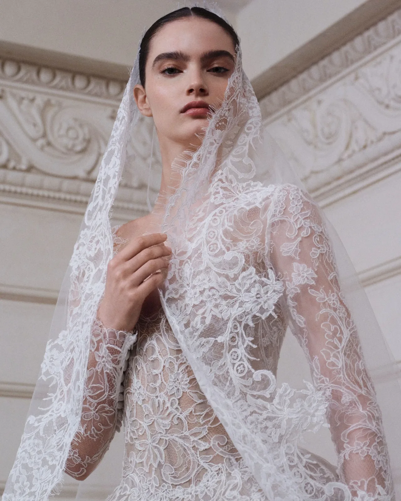 Long-sleeved lace bridal gown and veil from Elie Saab Spring Summer 2027