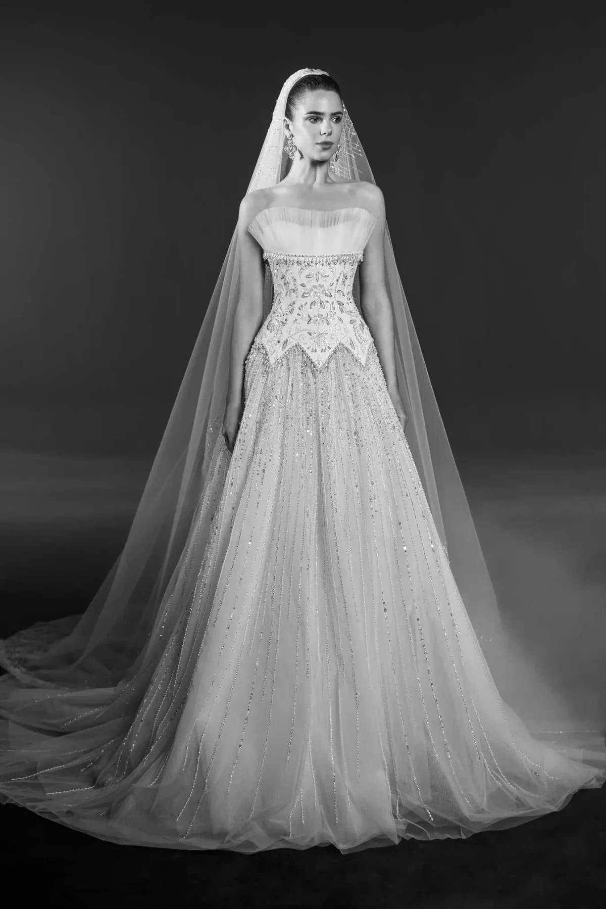 Strapless ivory bridal gown with veil from Georges Hobeika Bridal Spring 2027