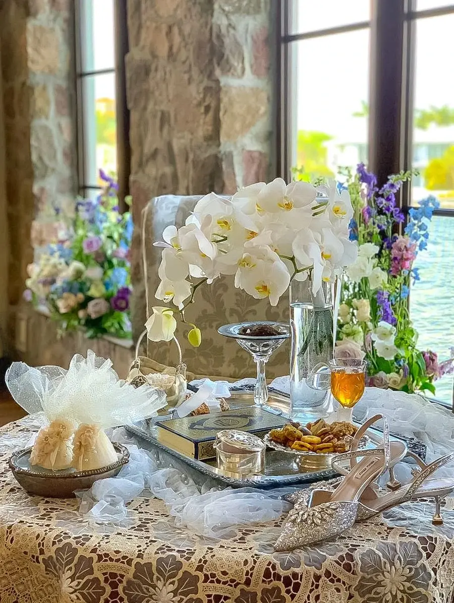 Intimate white orchid tablescape in natural light