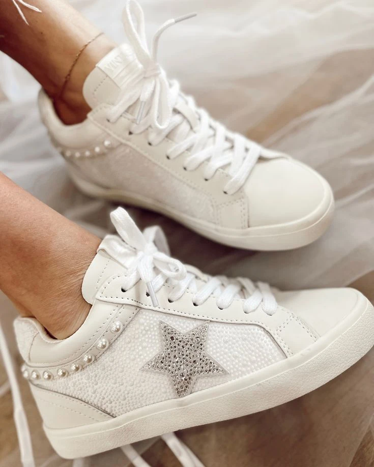 White bridal sneakers embellished with pearls and a crystal star