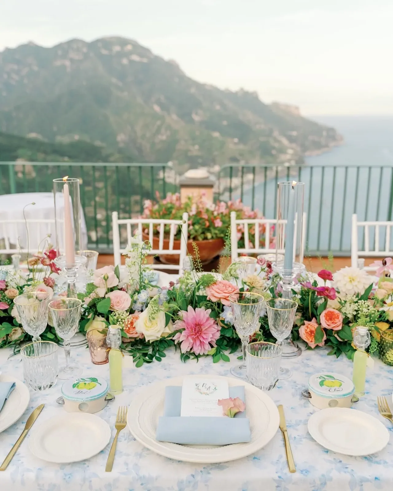Colorful Riviera wedding table overlooking the coast